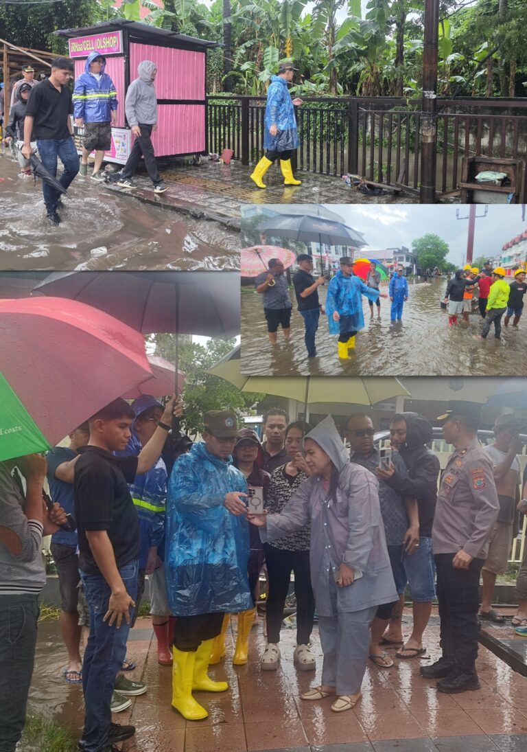 Ditengah Guyuran Hujan, Hengky Honandar Tinjau Langsung Lokasi Banjir di Kota Bitung